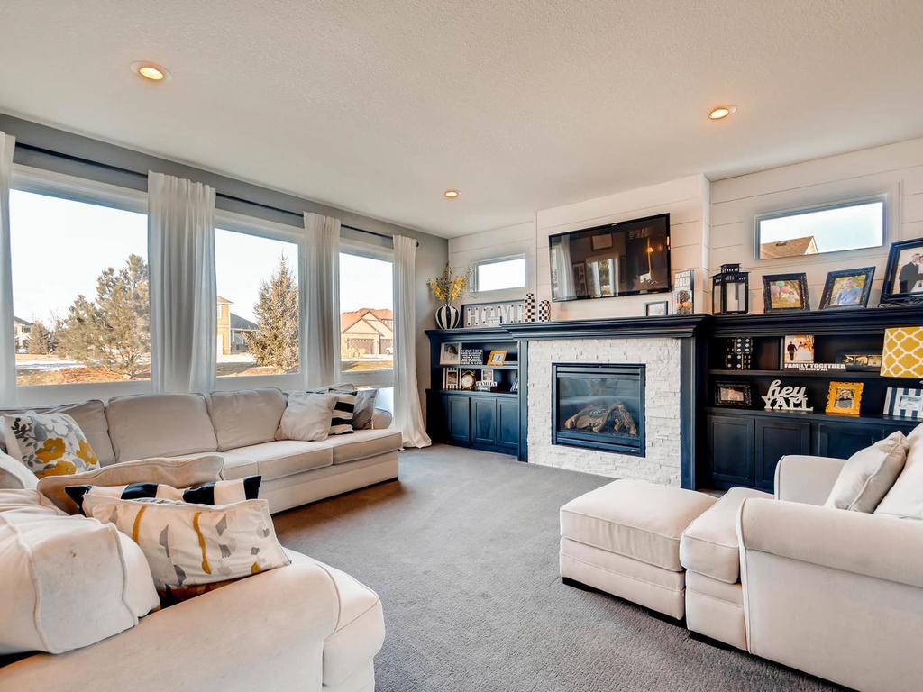 Wonderful Home Design Hastings Mn Part - 7: Main Level Living Room With Custom Built In Cabinets And Stone Surrounding Fireplace