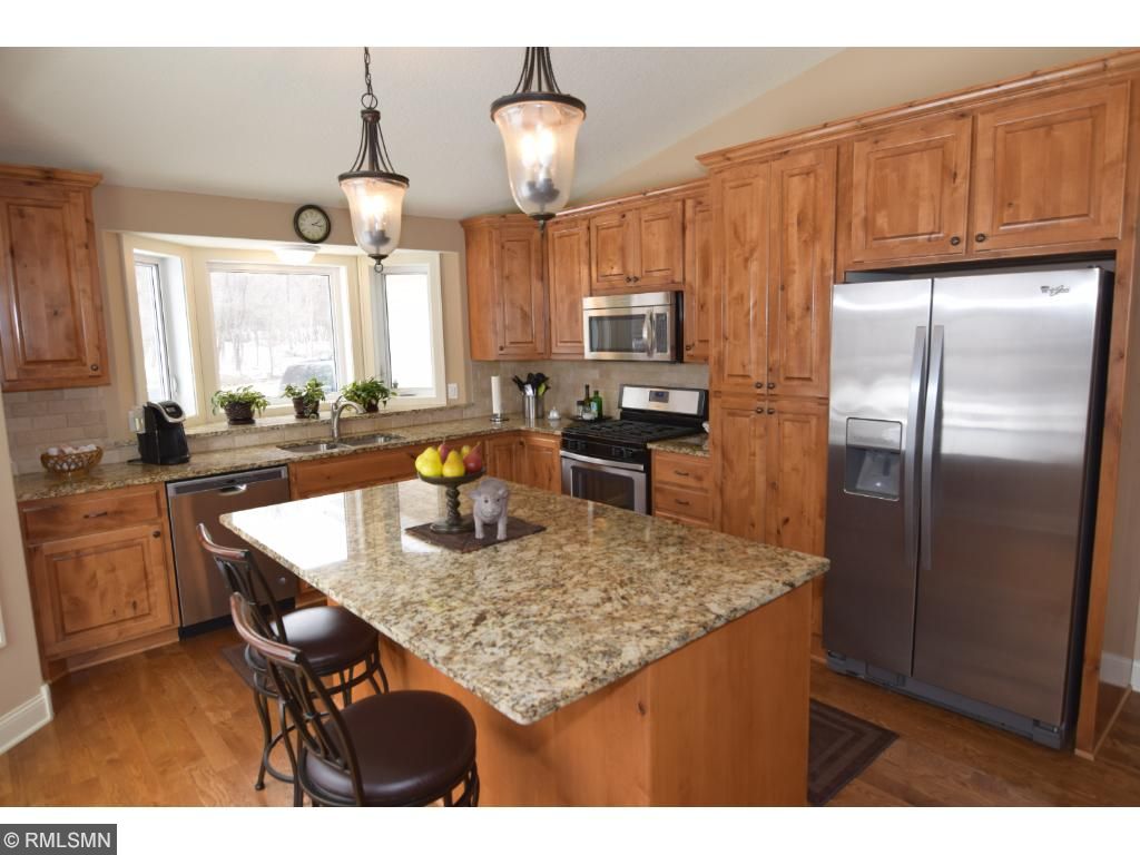 4336 Flowerfield Road Blaine Mn 55014 Mls 4910823 Edina Realty Granite Tops Hardwood Floors Custom Knotty Alder Cabinets And Stainless Steel Liances