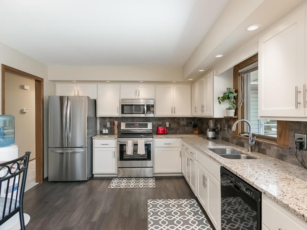 7024 Plymouth Avenue N Golden Valley Mn 55427 Mls 4839387 This Ious Updated Kitchen Features Brand New Granite Countertops Including The Breakfast Bar