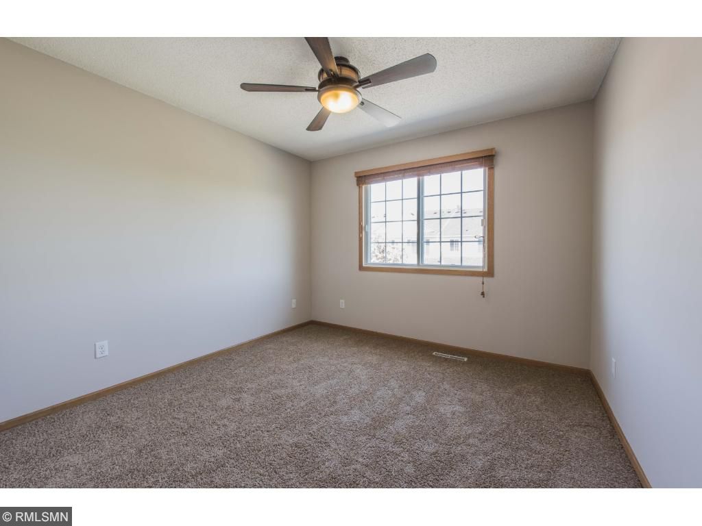 9621 Queensland Lane N Maple Grove Mn 55311 Mls 4829394 Upper Level Bedroom 2 Has Large Window Ceiling Fan And New Carpet