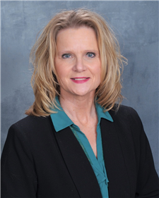 Julie Koester Larson, REALTOR GRI; Licensed in 1996